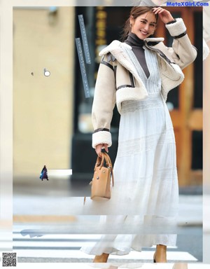 A magazine spread with a woman wearing a jacket and skirt.