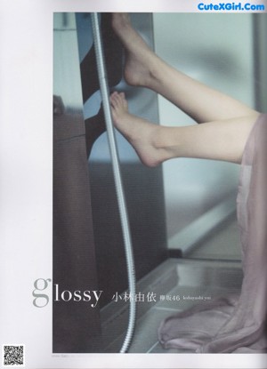 A magazine page with a picture of a woman in a kimono.