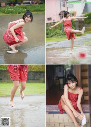 A woman in a red dress sitting on the floor with her feet up.