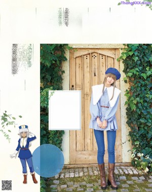 A woman in a blue hat is posing for a magazine.